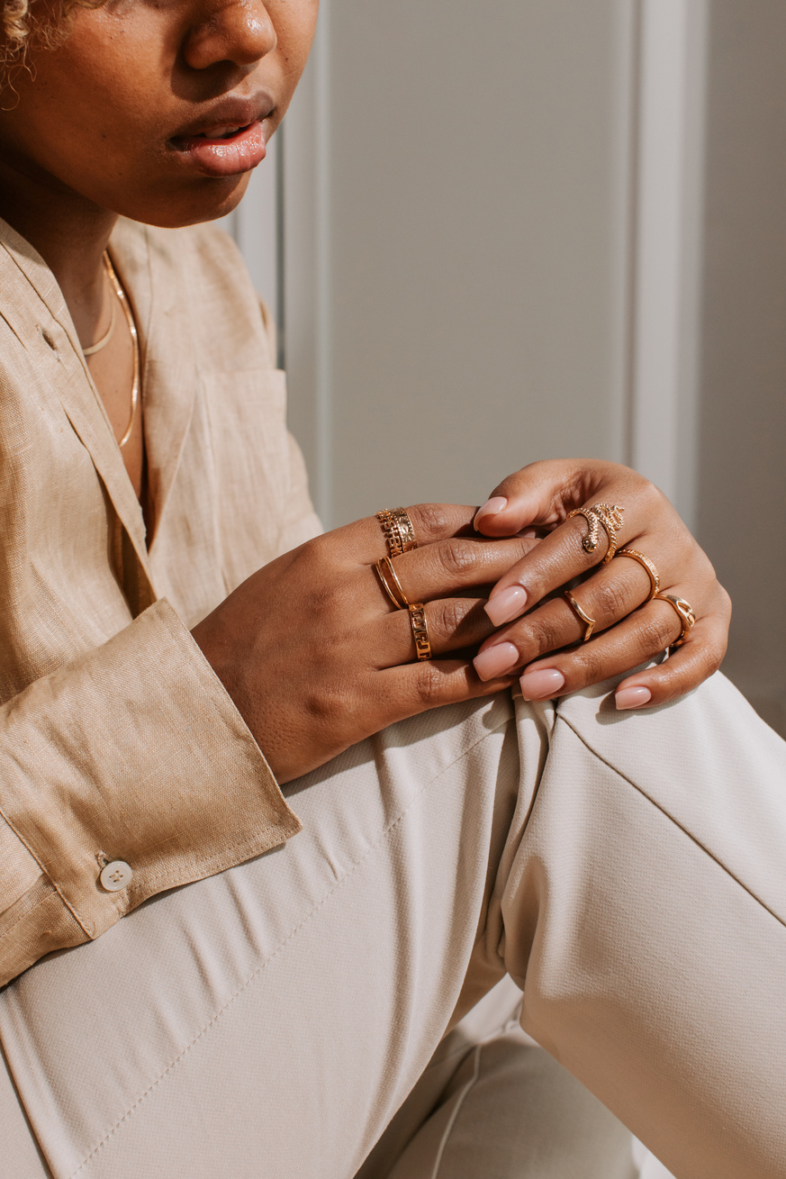 Woman Wearing Gold Jewelry